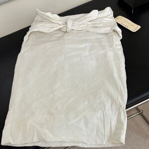 Designer Chic White Pencil Skirt lined .  Rouching at back